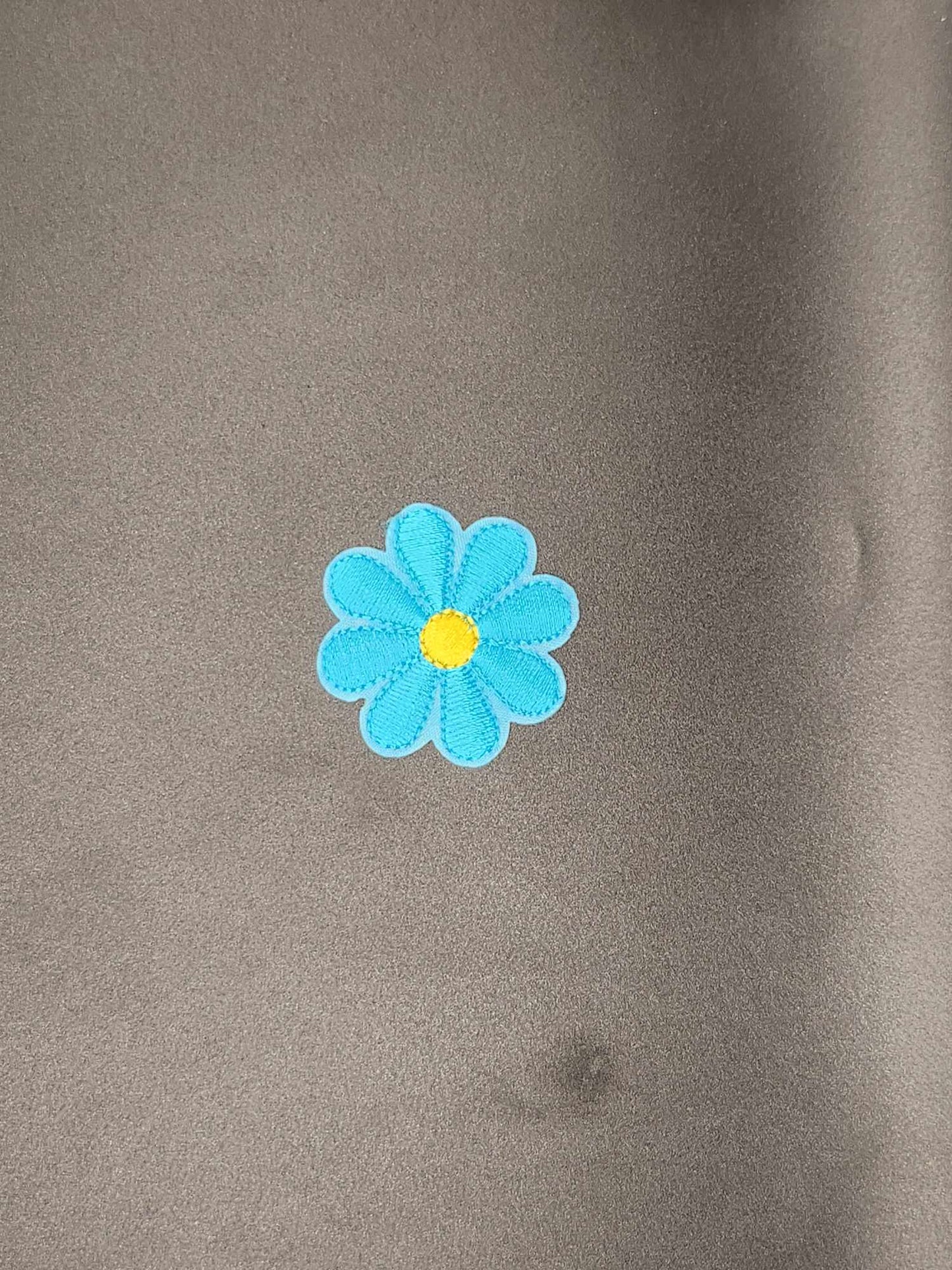 Embleem bloem licht blauw