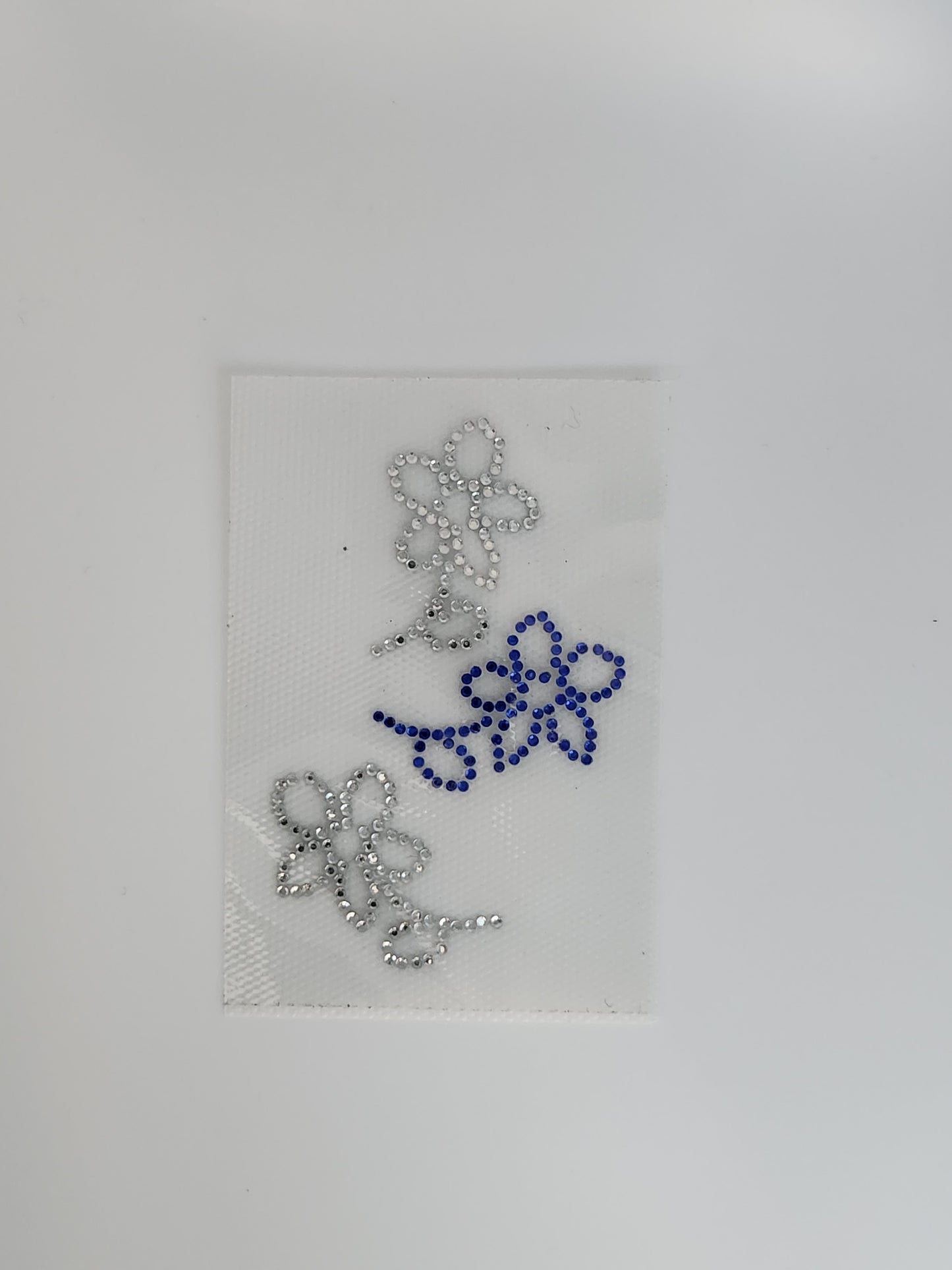 Strass embleem bluumpkes blauw/zilver