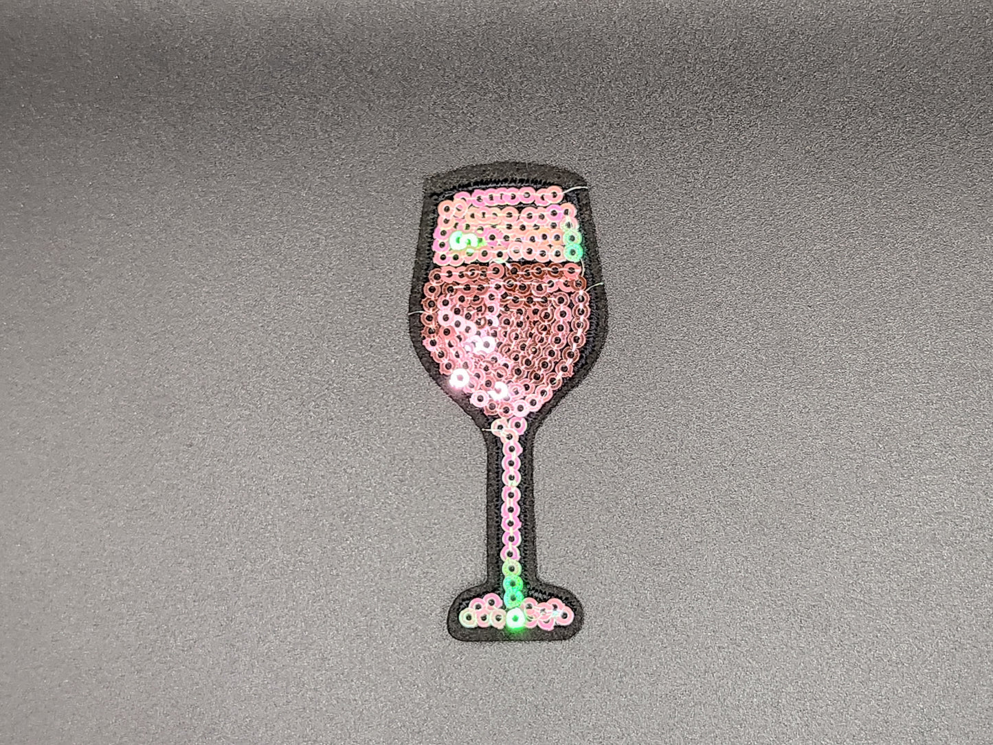 Embleem rosé glas pailletten
