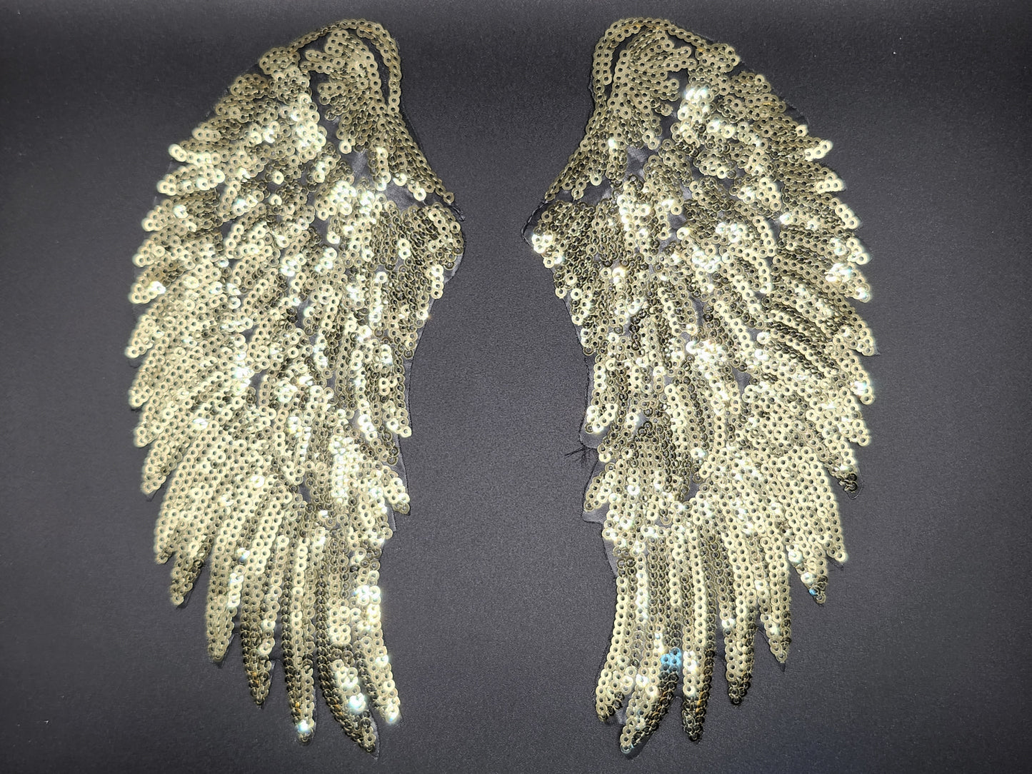 Embleem pailletten engelen vleugels klien goud