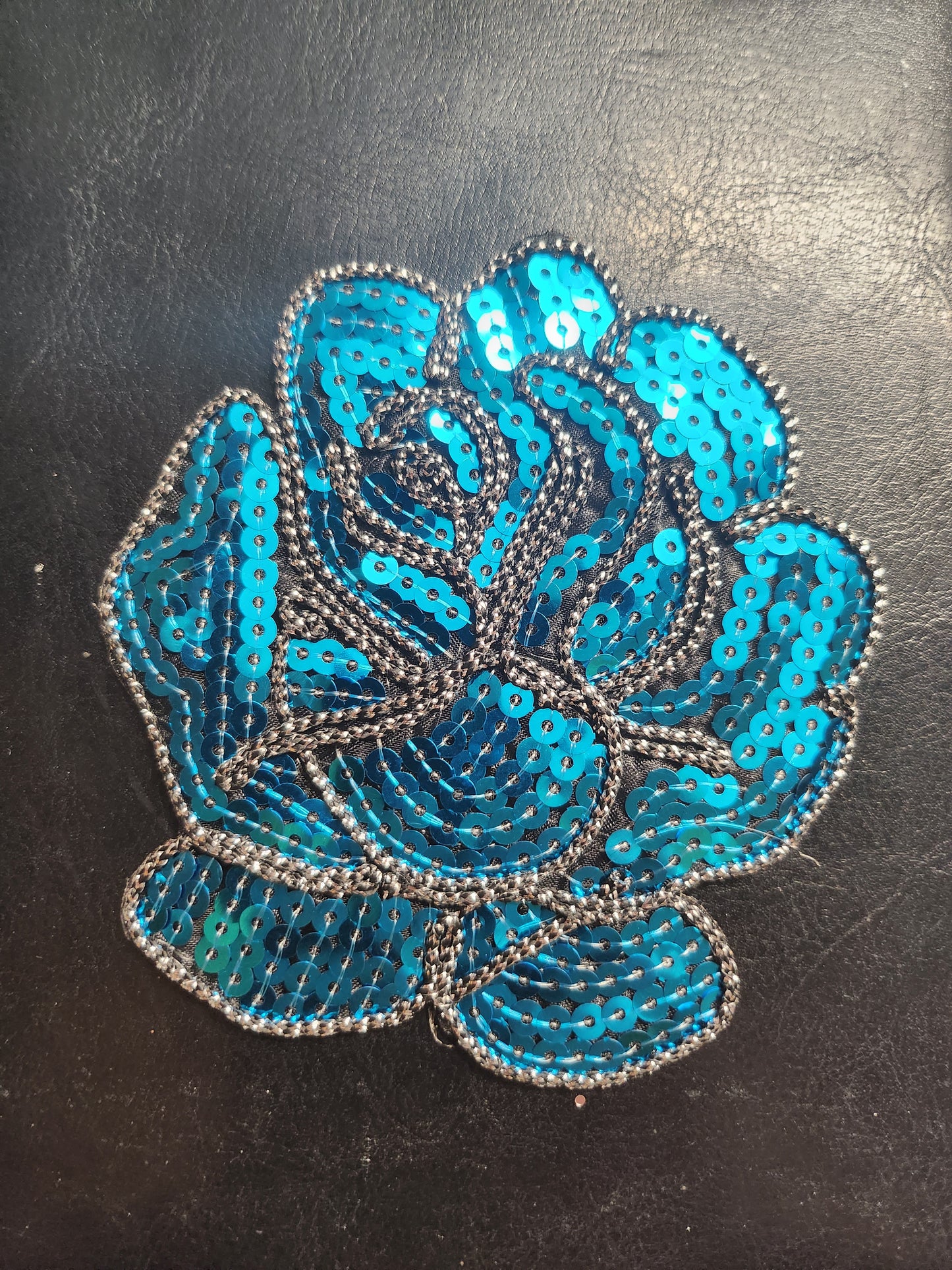 Embleem pailletten roos blauw